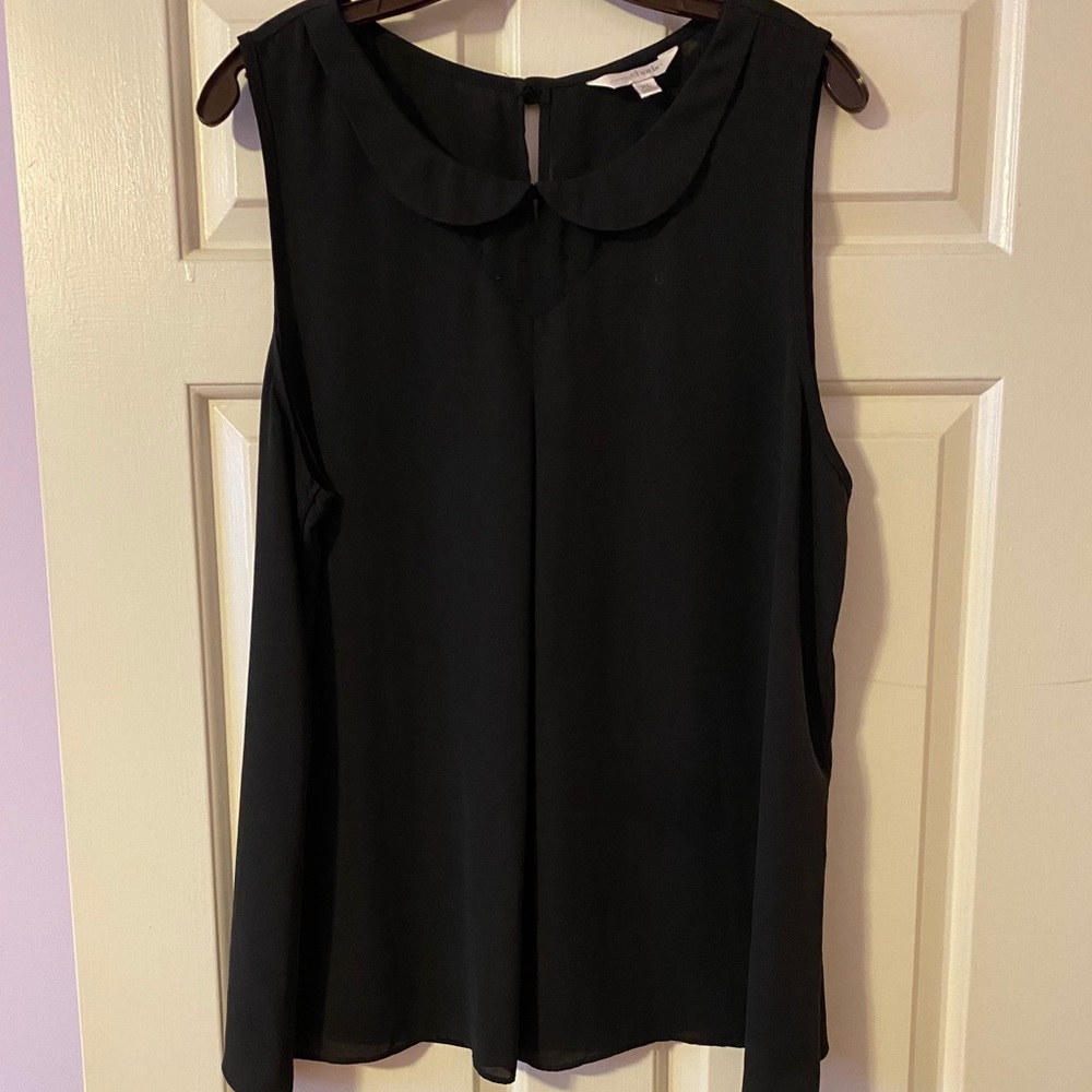 Black sleeveless blouse